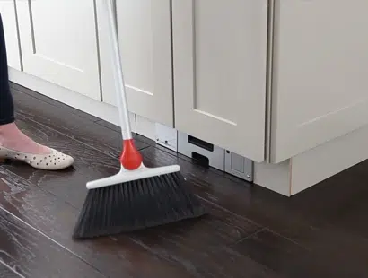 Toe kick vacuum