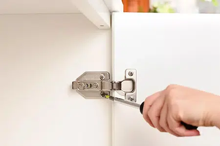 How to Adjust Cabinet Door Hinges- Step By Step Guide 3 Step 2 Loosen the screw